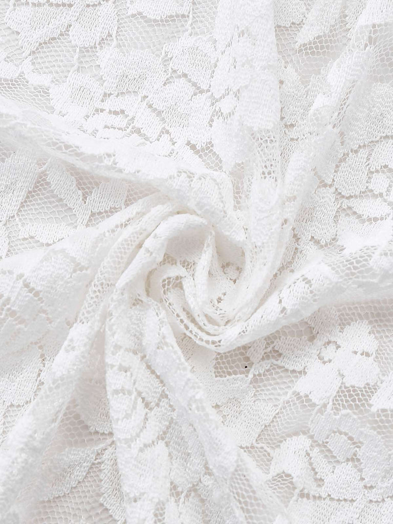 Robe victorienne blanche en dentelle à manches gigot des années 1980