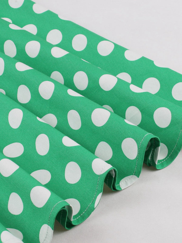 Robe verte à pois à bretelles spaghetti années 1950