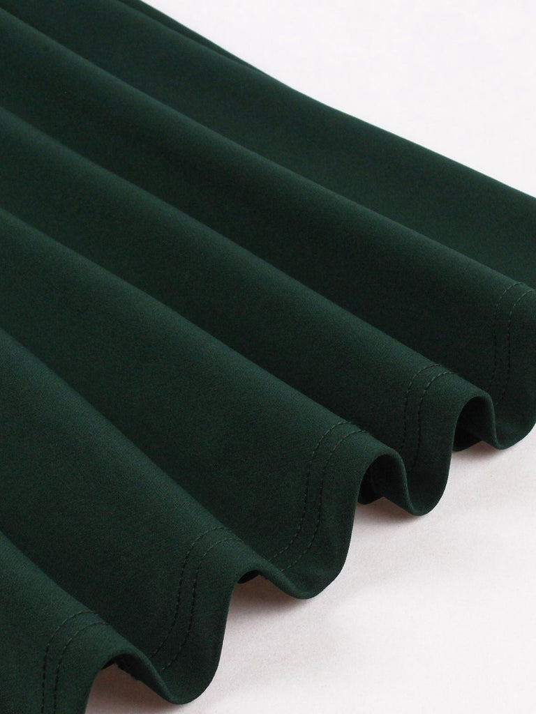 Jupe à poches et boutons latéraux unis des années 1950