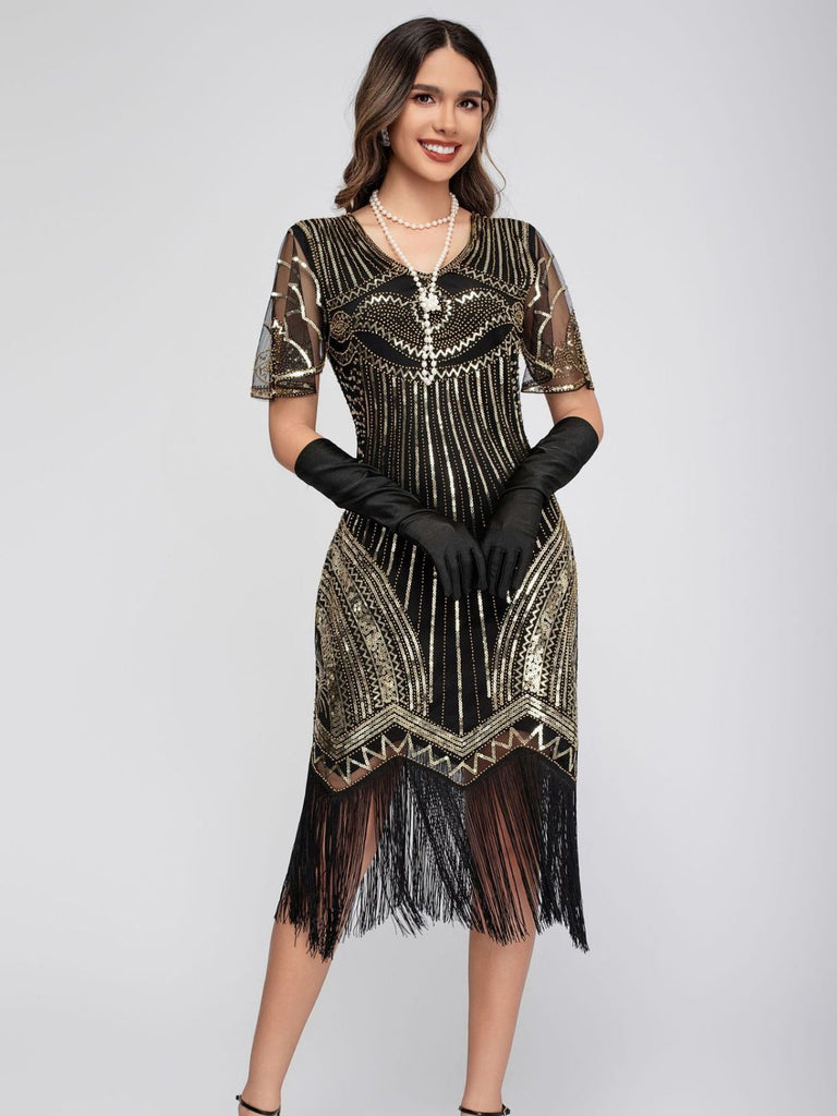 Robe Charleston à paillettes et pompons col rond années 1920