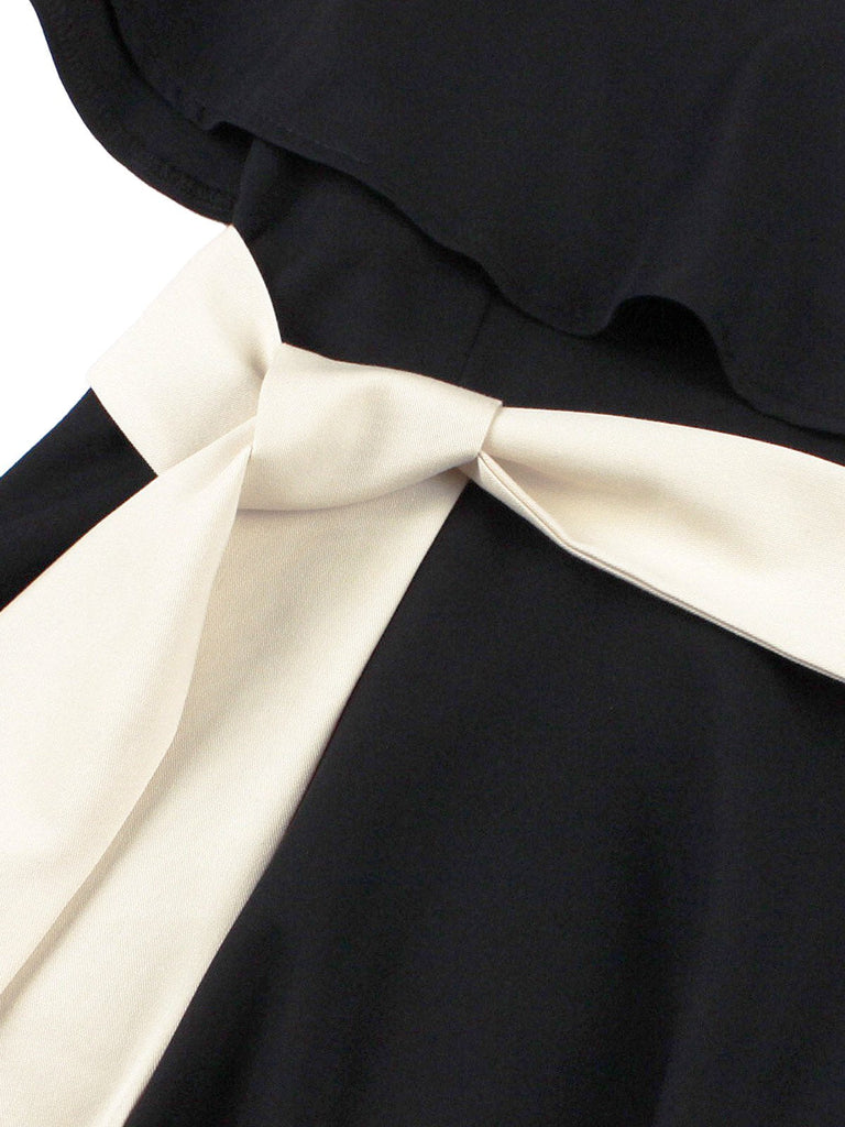 Robe cape noire à col en V et ceinture années 1950