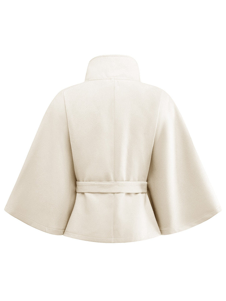 Veste cape à col roulé ceinturée unie années 1970