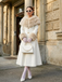 Manteau à col en fourrure multicouche crème années 1950