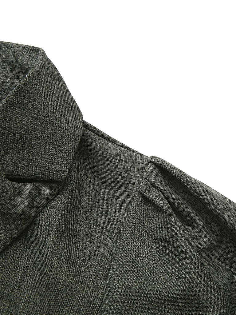 Robe boutonnée col cranté manches lanternes des années 1940