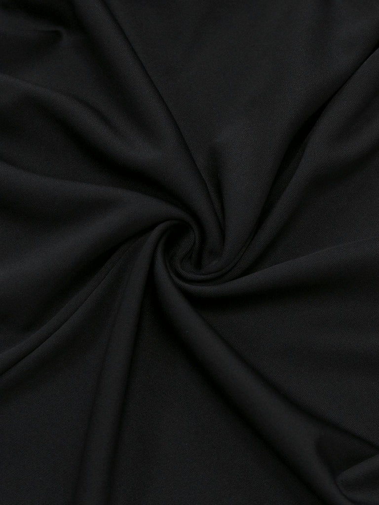 Robe col nœud et fente sur le devant noire des années 1930