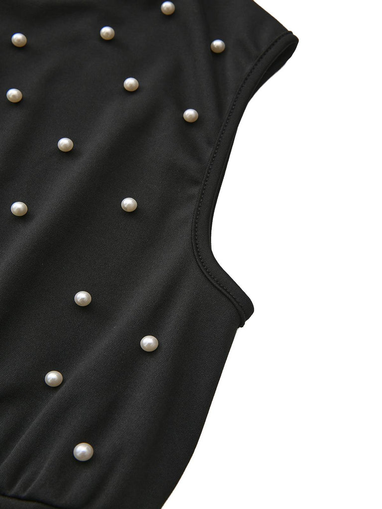 Combinaison noire à nœud et perles avec ceinture années 1950