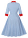 Robe bleue col montant et nœud contrastant années 1950