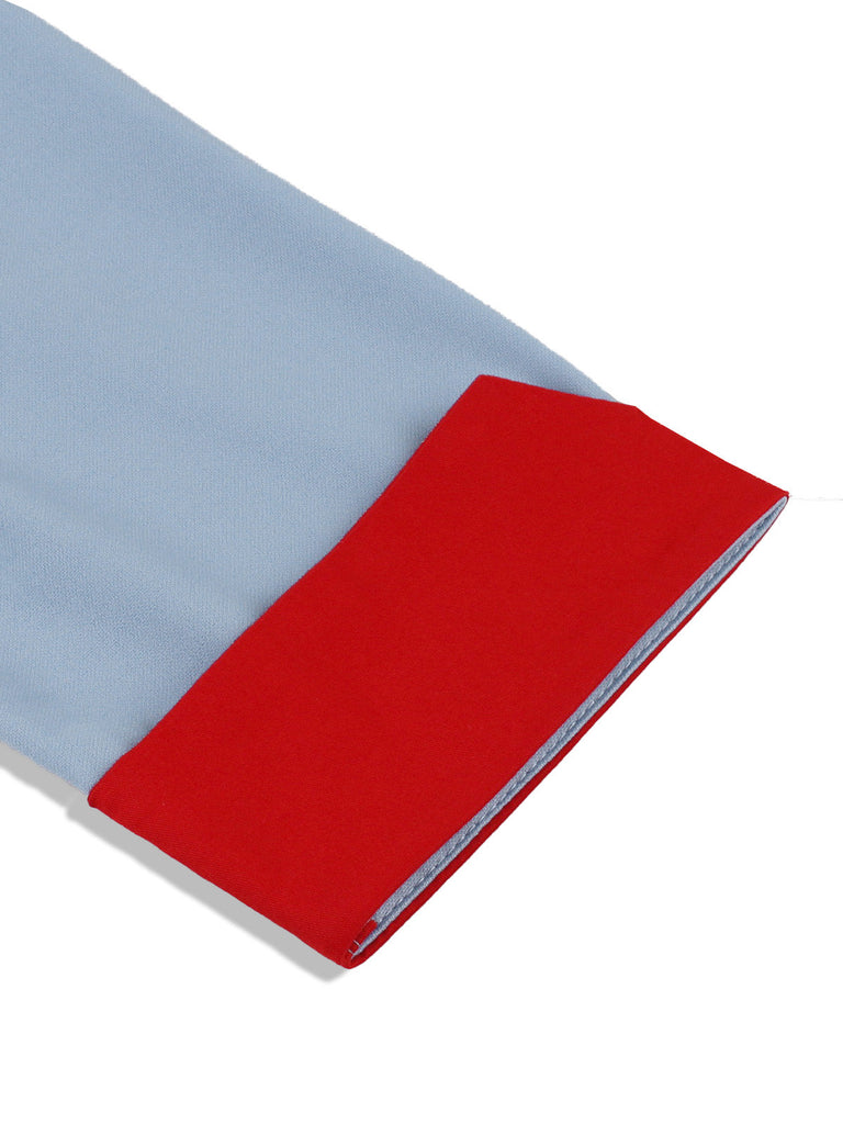 Robe bleue col montant et nœud contrastant années 1950