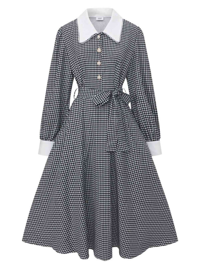 Robe noire à manches bouffantes et boutons nacrés style pied-de-poule années 1940
