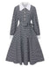 Robe noire à manches bouffantes et boutons nacrés style pied-de-poule années 1940