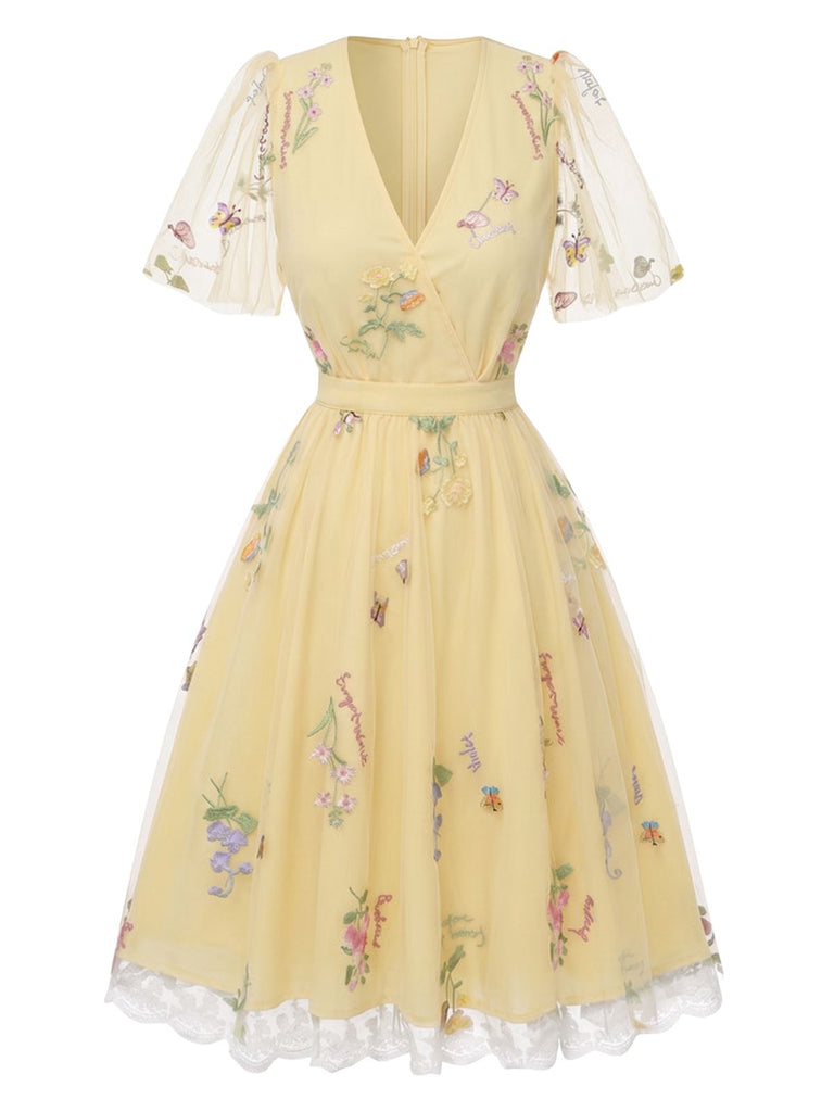 [Prévente] Robe jaune manches bouffantes et broderies florales en résille années 50