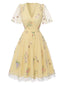 [Prévente] Robe jaune manches bouffantes et broderies florales en résille années 50