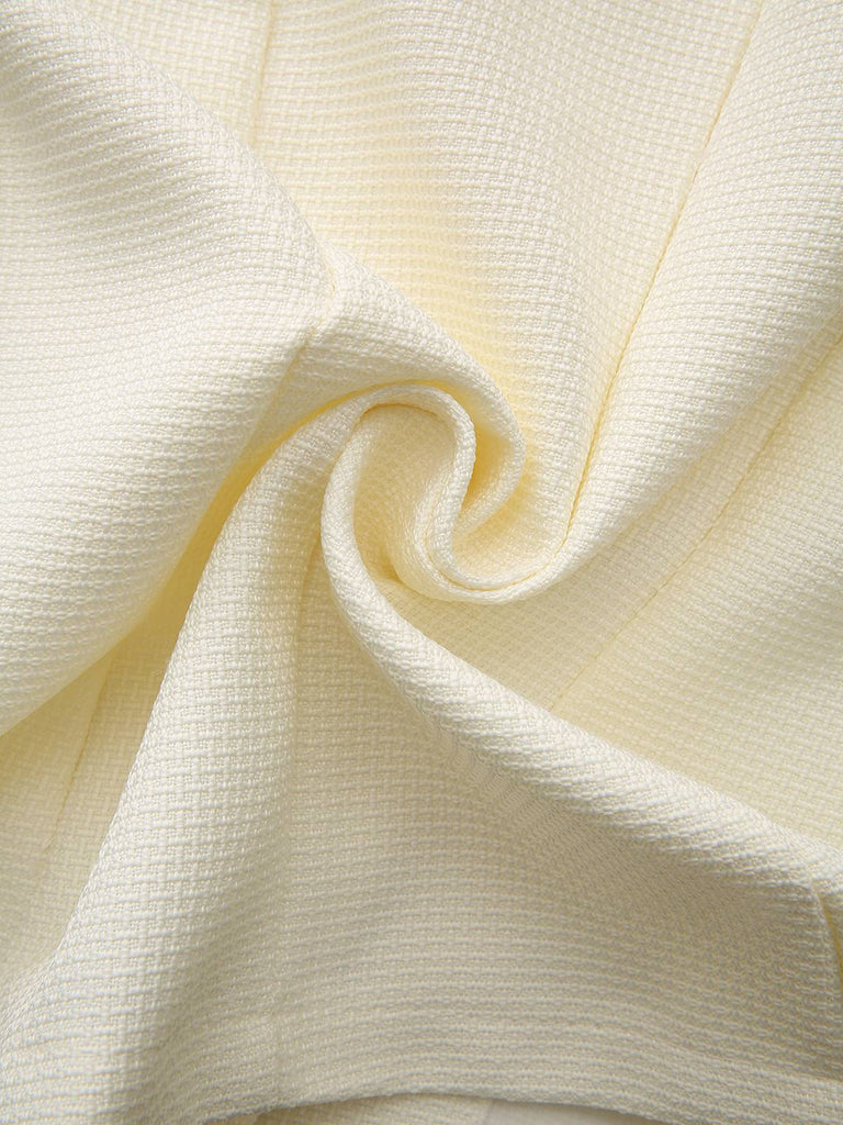 Veste de costume beige à manches longues et boutons années 1950