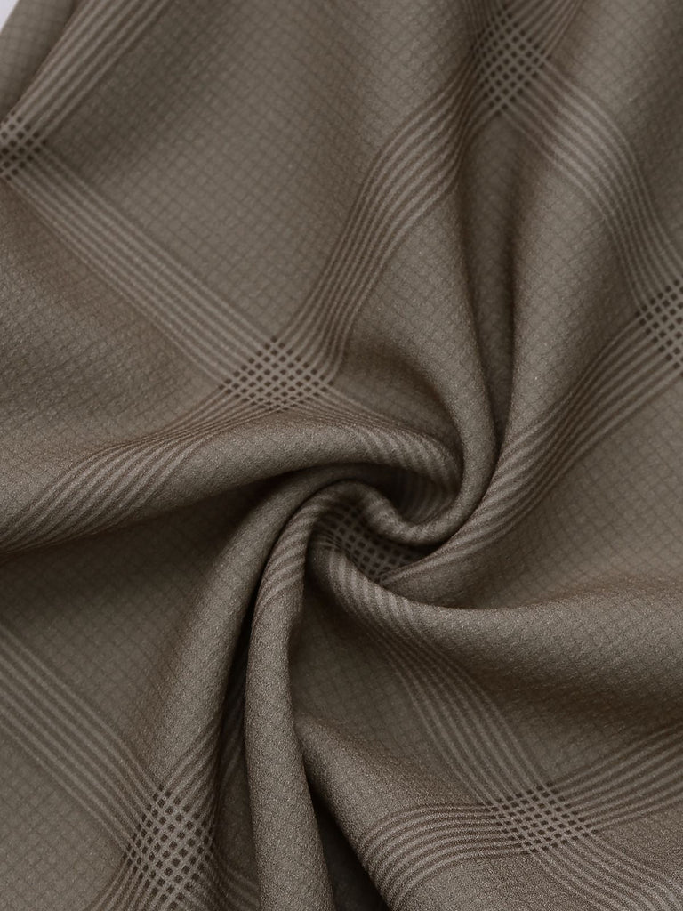 Combinaison à carreaux verts avec revers et ceinture années 1930