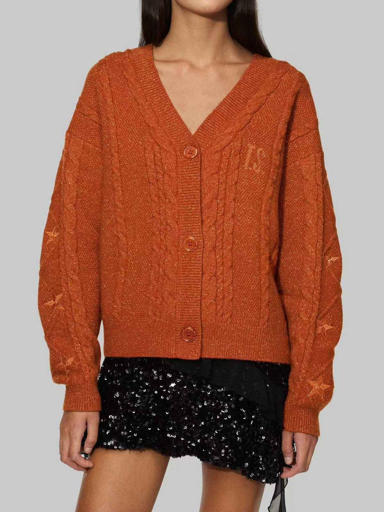 Gilet orange à col en V et broderie d'étoiles années 1940