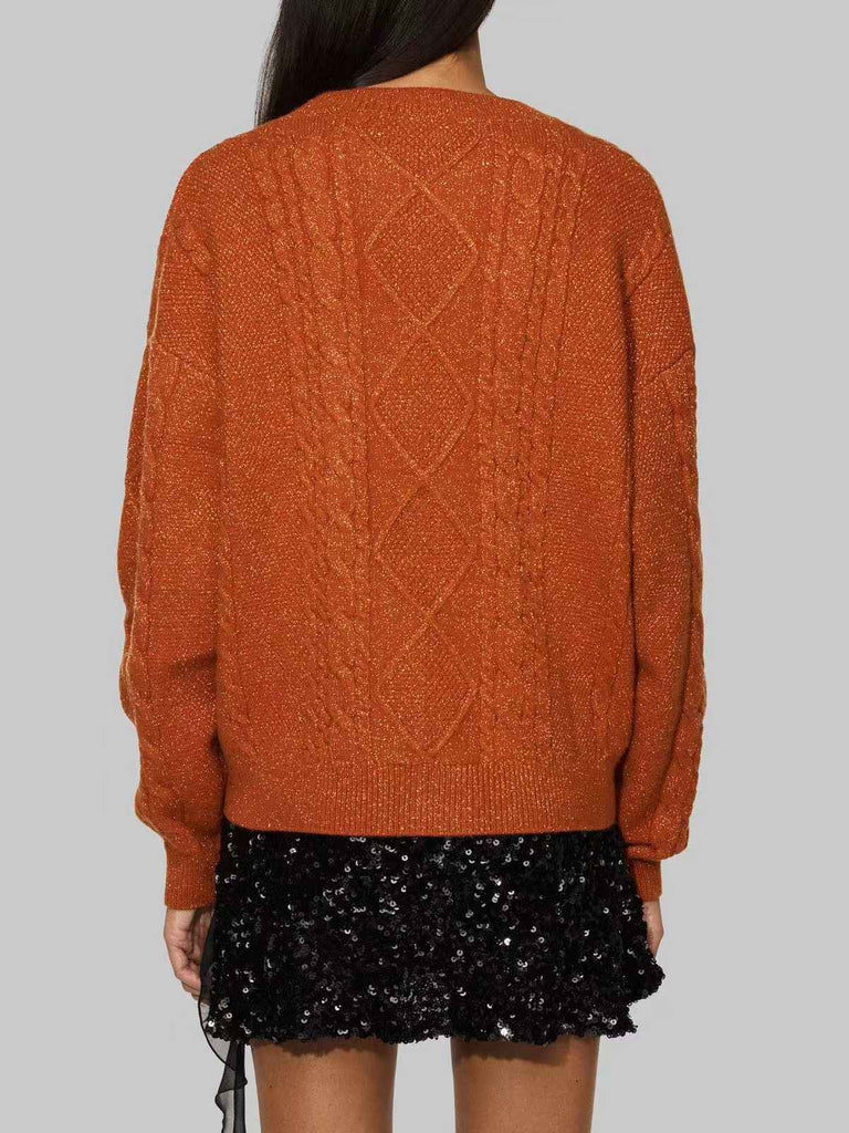 Gilet orange à col en V et broderie d'étoiles années 1940