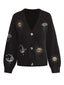 Gilet tricoté à manches lanternes brodées soleil et lune des années 1980