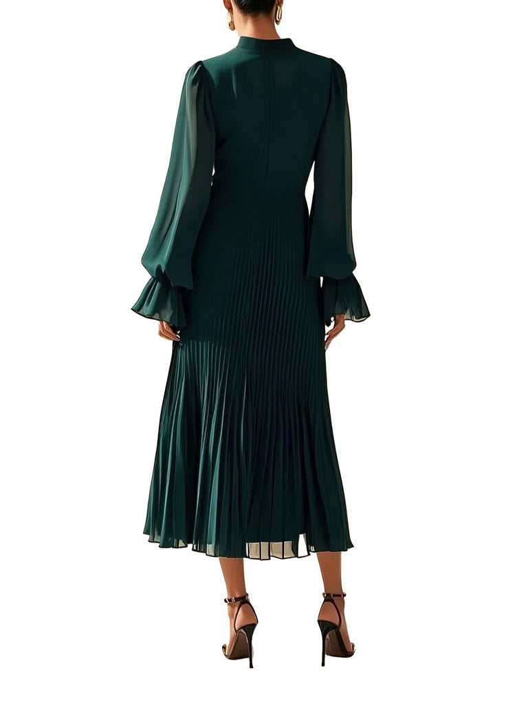 Robe plissée verte unie à ourlet volanté années 1950