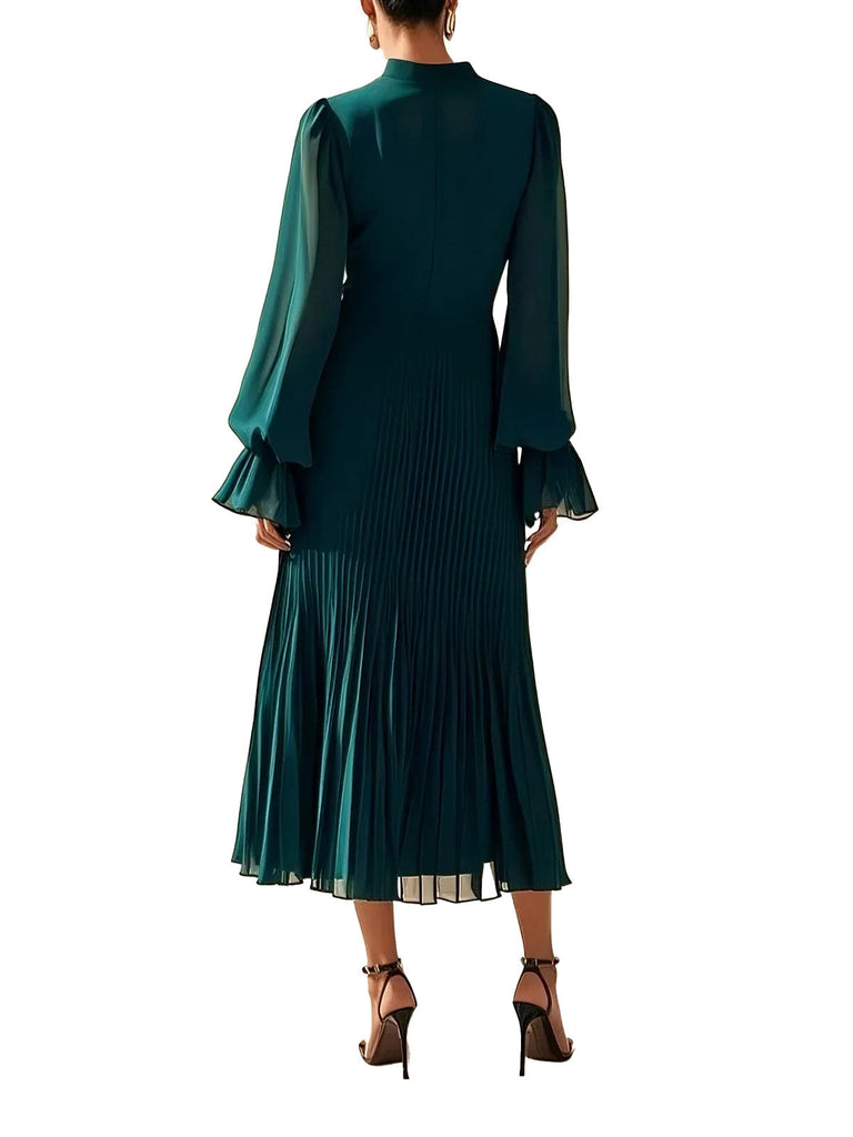 Robe plissée verte unie à ourlet volanté années 1950