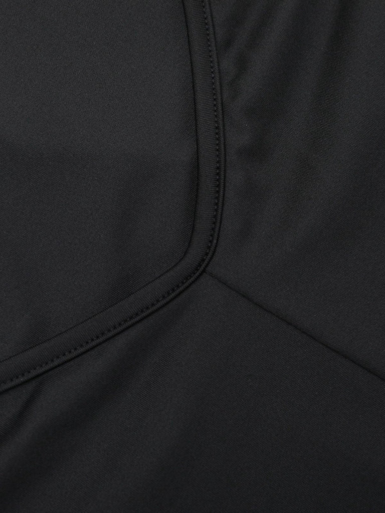 Combinaison noire évasée dos nu à bretelles années 80