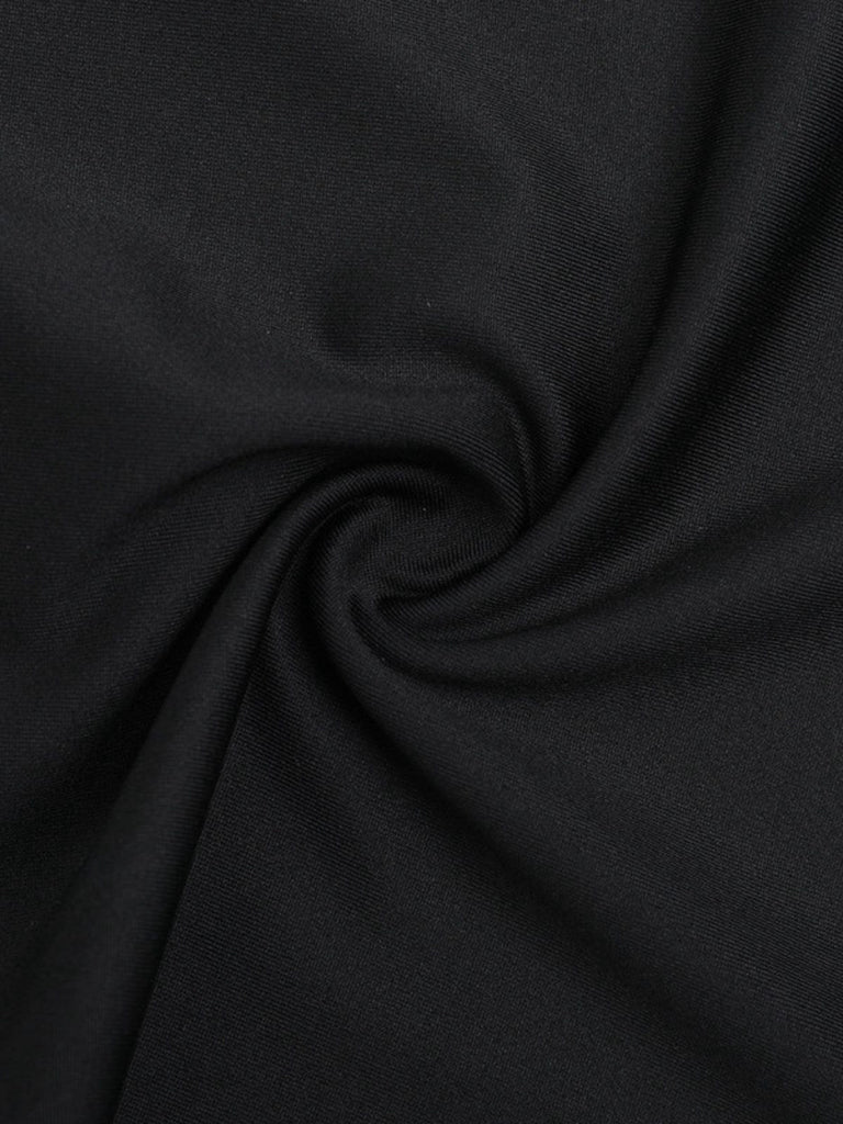 Combinaison noire évasée dos nu à bretelles années 80