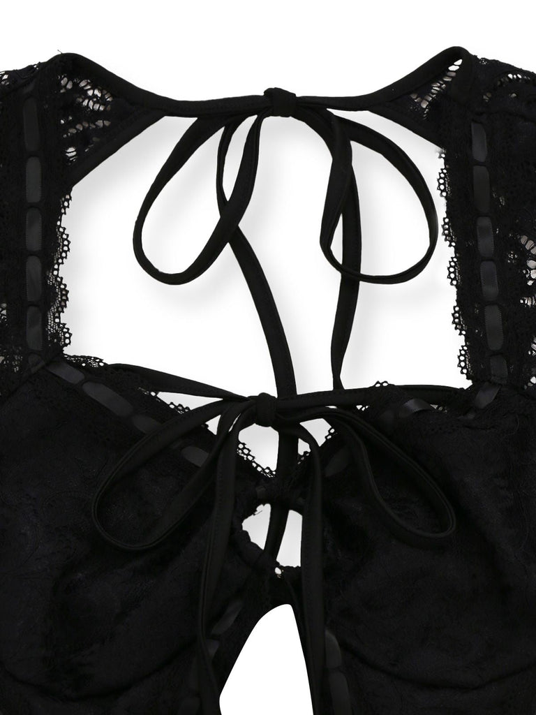 Combinaison body noire à manches longues et découpes en dentelle années 1950