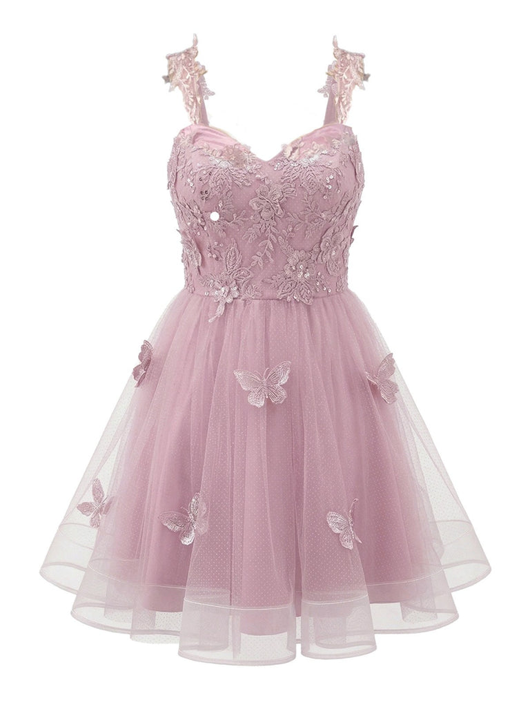 Robe courte rose à paillettes et papillons années 60