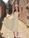 Robe midi rose fines bretelles floral années 1950