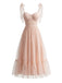 Robe rose foncé pois suisses et manches bouffantes années 1950