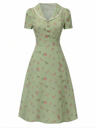 Robe vert à manches bouffantes et revers fleuris années 1940