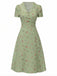 Robe vert à manches bouffantes et revers fleuris années 1940