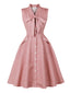 Robe swing rose à pois et nœud des années 50