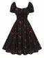 [Prévente] Robe noire imprimé cerises manches bouffantes années 1950
