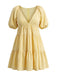 Robe babydoll jaune col V et manches bouffantes années 1950