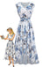 Robe blanche sans manches motif floral col V et coupe asymétrique années 50