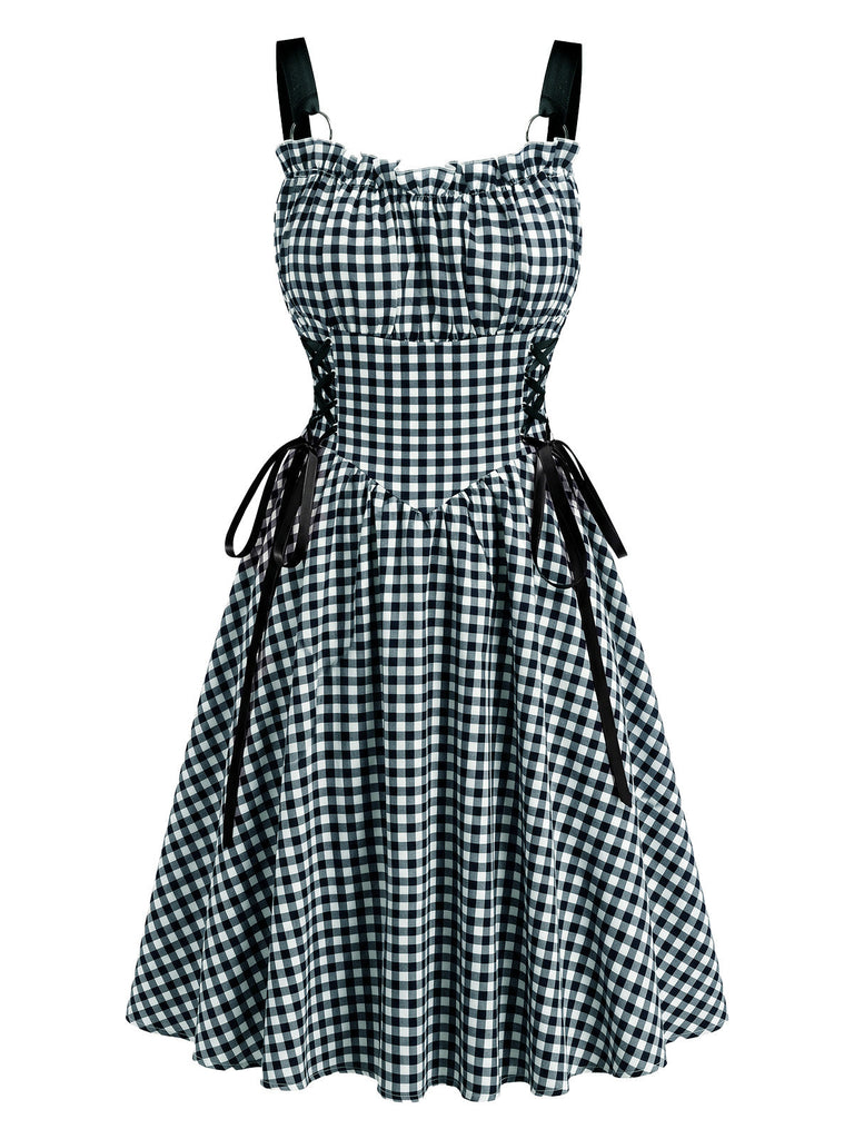 Robe taille haute à larges bretelles, laçage et anneau métallique Années 1950