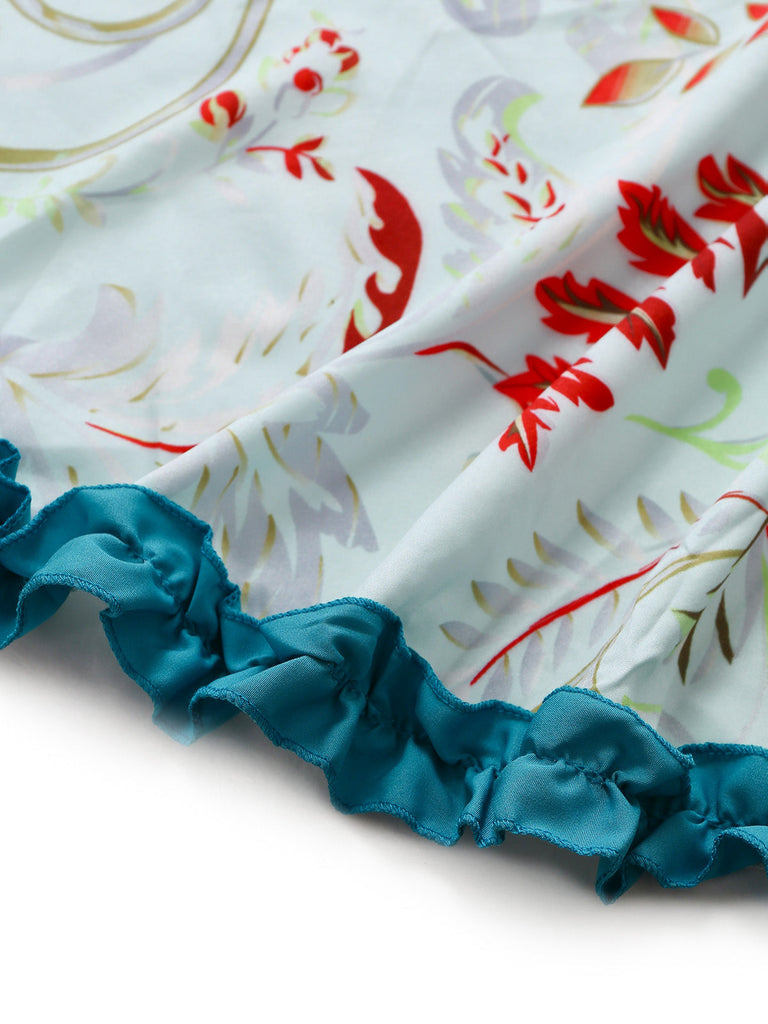 Robe bleue rococo à fleurs, manches cloche et volants années 1970