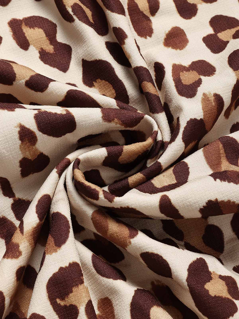 [Prévente] Robe bohème à imprimé léopard, col V, franges et manches cloche Années 1970