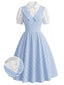 [Prévente] Robe évasée bleue motif vichy manches bouffantes et effet deux-pièces années 50