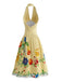 Robe jaune fleurs dos nu et encolure américaine années 50