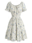 Robe fleurs encolure carrée et volants années 50