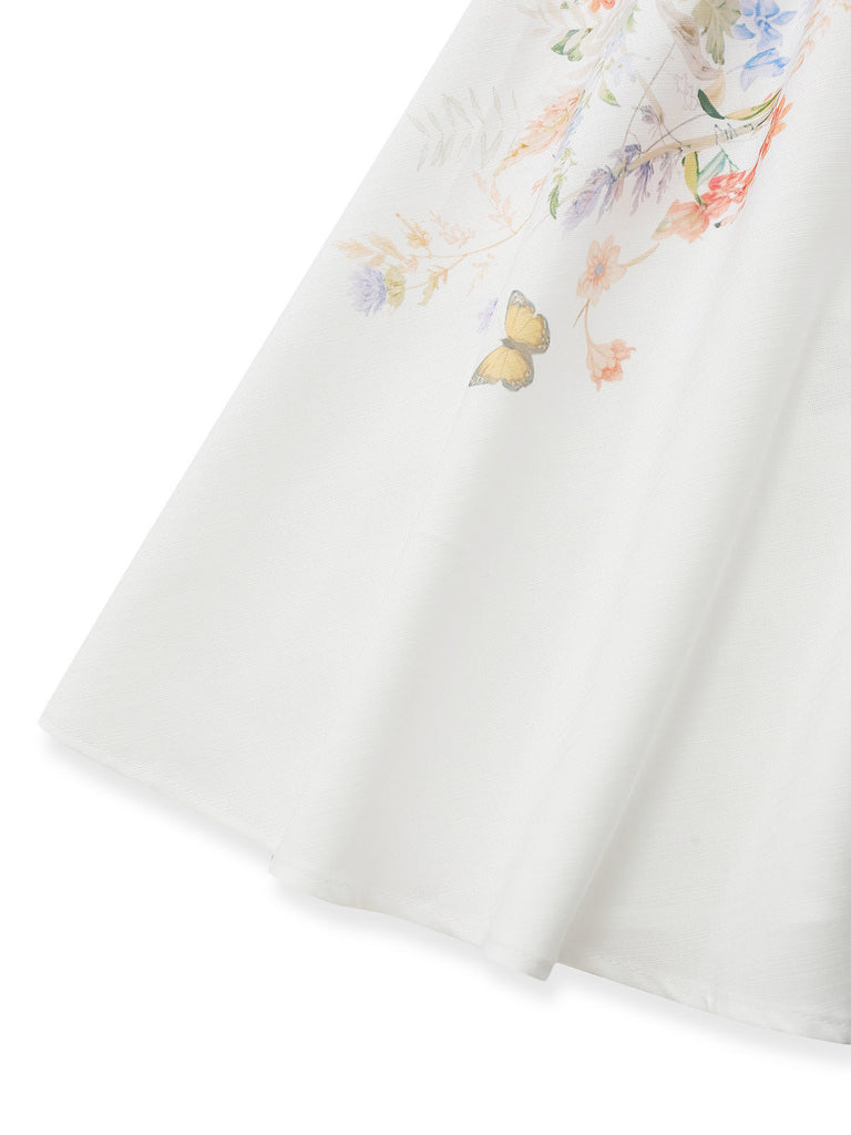 Robe blanche florale à manches longues, boutons et ceinture Années 1940