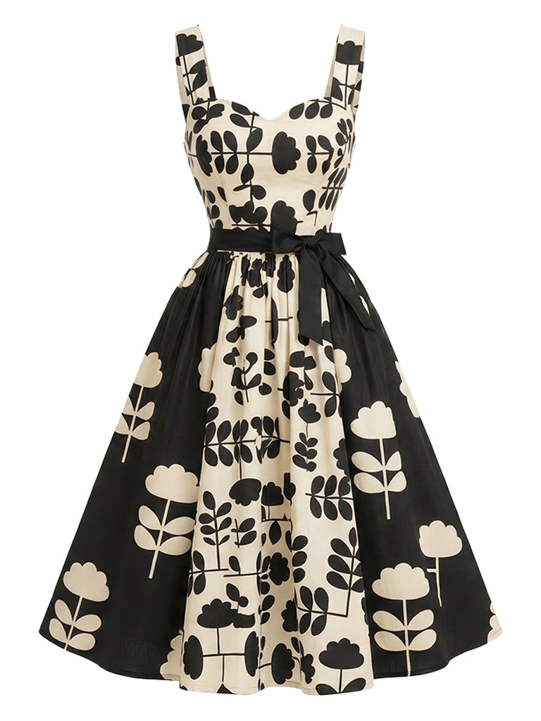 [Prévente] Robe évasée noire et blanche à fleurs contrastées années 1950