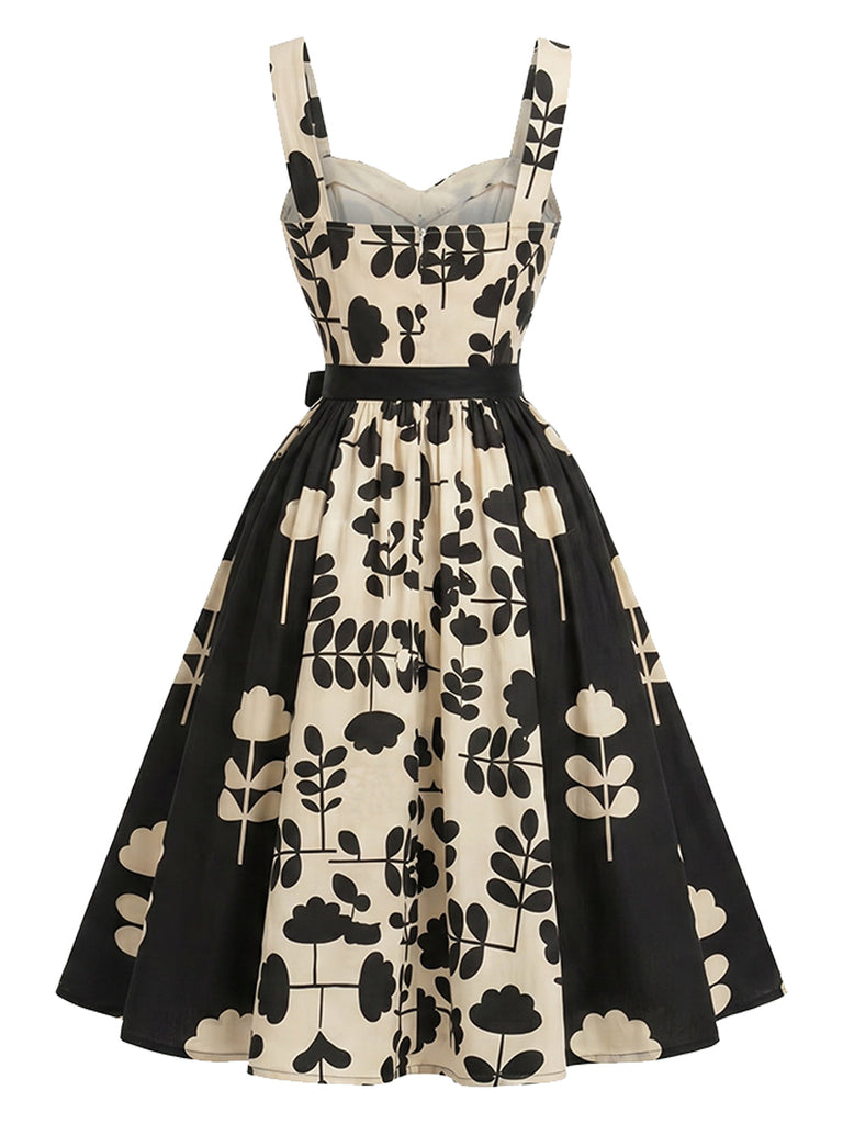 [Prévente] Robe évasée noire et blanche à fleurs contrastées années 1950