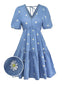 Robe bleue col V manches bouffantes et broderies marguerites années 70