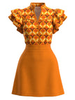 Robe orange motif géométrique col montant volants années 60