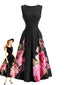 Robe noire fleurs col rond et plis années 50