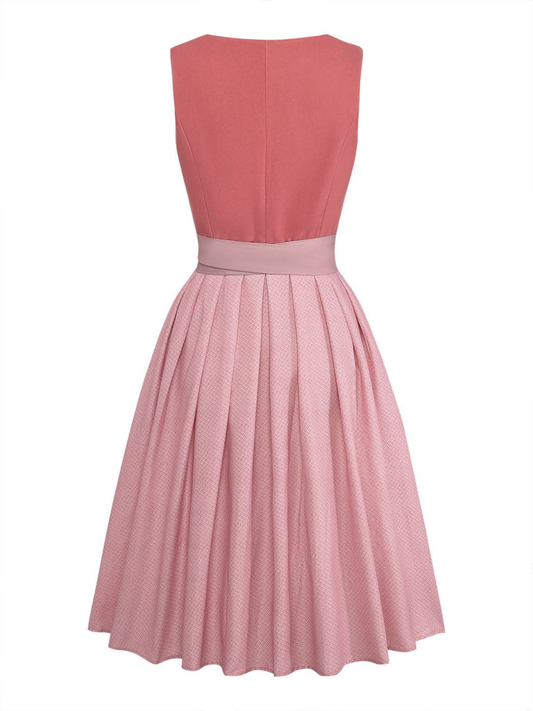 Robe et tablier roses velours encolure en cœur et boutonnage sur le devant années 1950