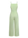 Combinaison vert à bretelles fines, nœud, jacquard et jambes larges Années 1950