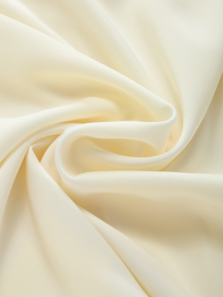 [Prévente] Blouse ivoire en satin à col noué et poignets contrastés années 1970